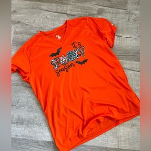 Women’s Badger Brand. V-Neck, short sleeve, dri-fit material shirt.